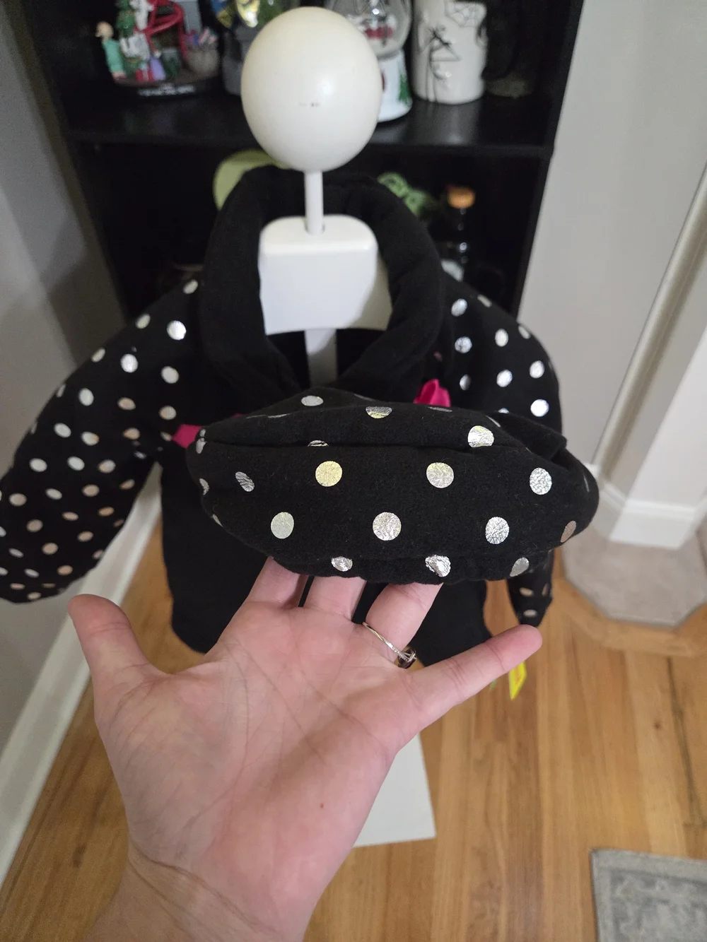 Penelope Mack Black Coat with White Polka-Dot Sleeves And Matching Hat